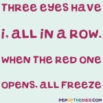 Riddle: Three eyes have I, all in a row; when the red one opens, all freeze.